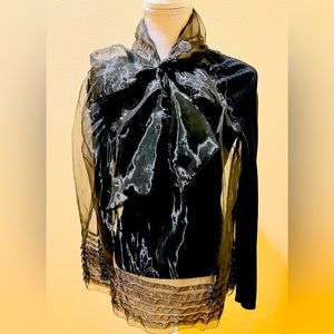 Black Sweater layered with Organza. Ties in bow around neckline. Size L.
